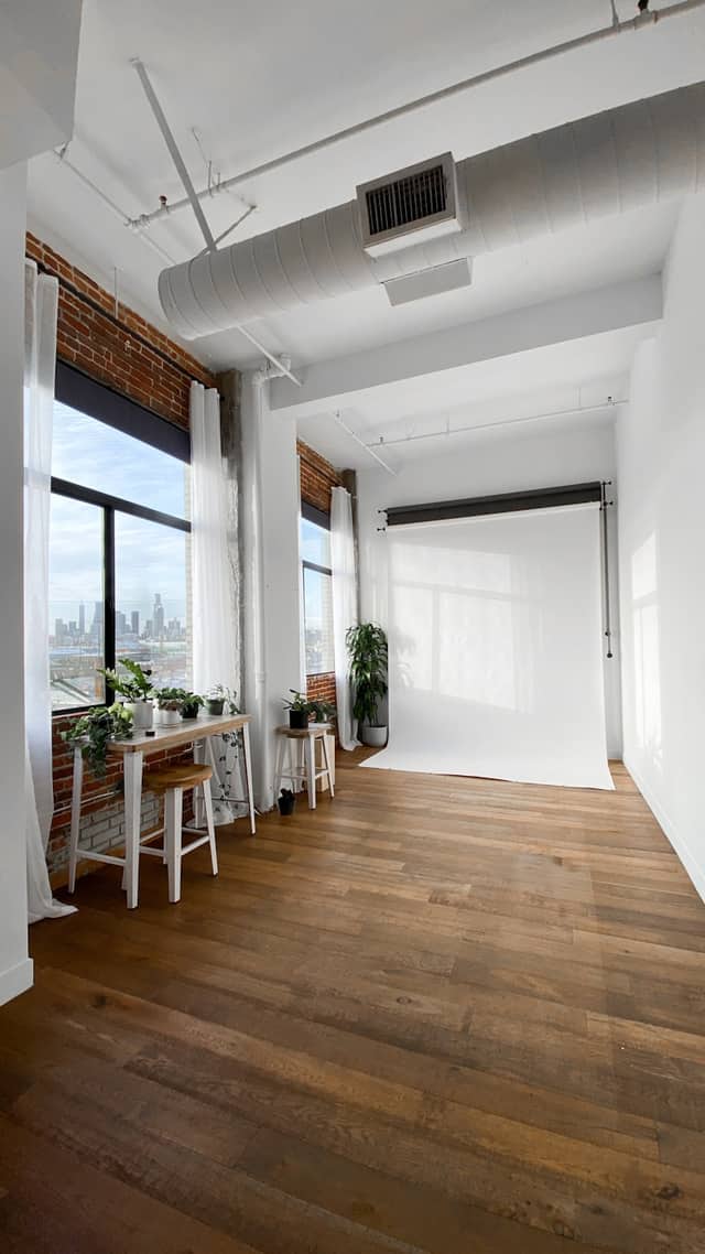 Professional office workspace with wood flooring